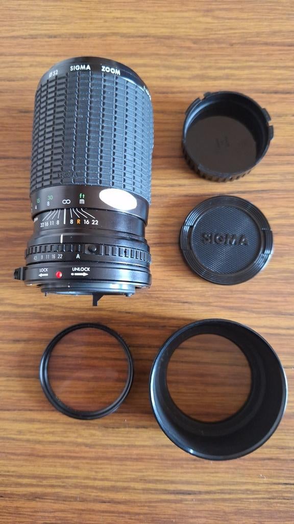 Sigma Zoom lens 52 mm F 80 tot 200 mm met filter, zonnekap, Audio, Tv en Foto, Foto | Lenzen en Objectieven, Zo goed als nieuw