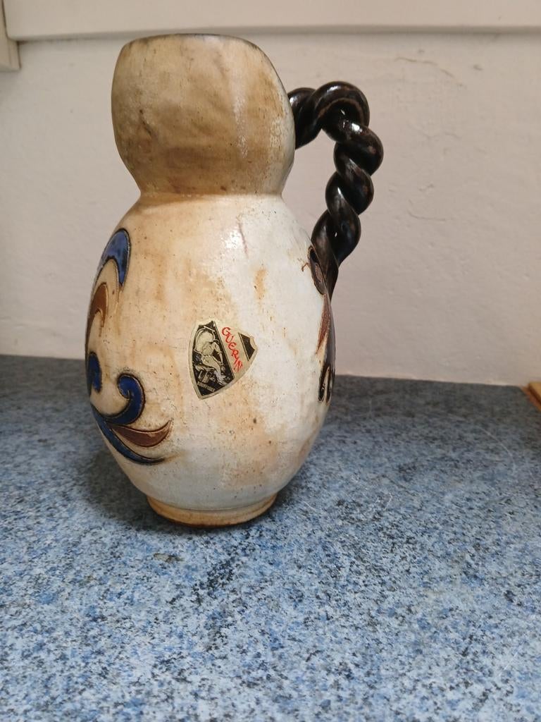 Cruche décor oiseau, Enlèvement