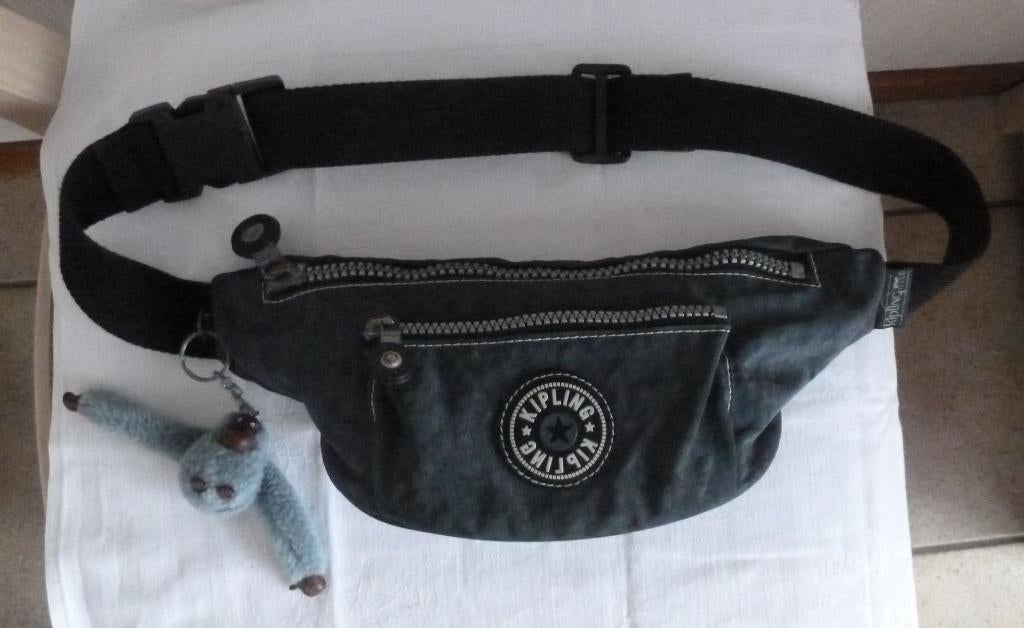 Kipling grijze bananentas + aap, Handtassen en Accessoires, Overige Accessoires, Gebruikt, Ophalen of Verzenden