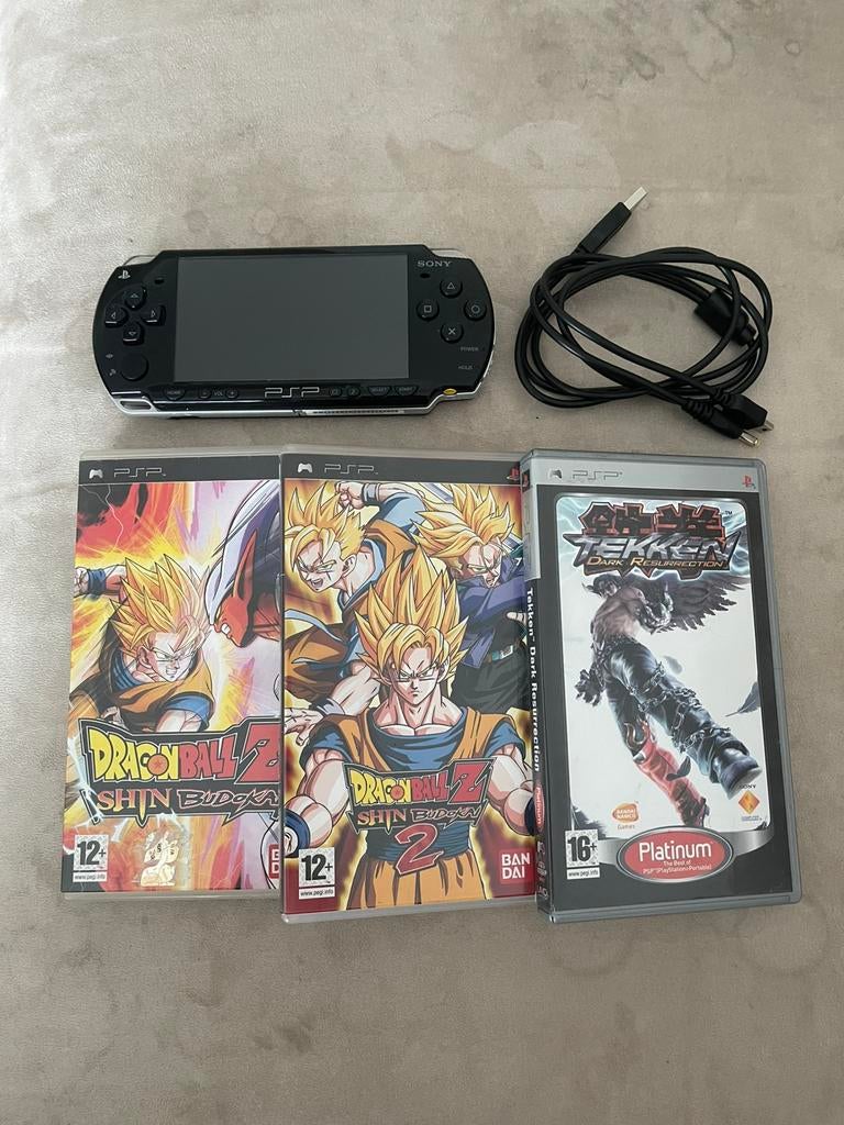 Psp 2004 met oplader + 4 spellen, Games en Spelcomputers, Ophalen, Zwart, PSP, Gebruikt