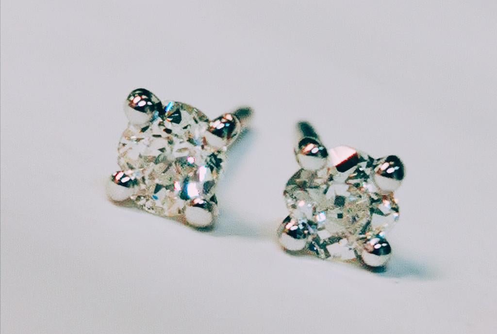 Solitaire oorstekers met diamanten 0,55kt, Handtassen en Accessoires, Oorbellen, Ophalen of Verzenden, Zo goed als nieuw, Met edelsteen