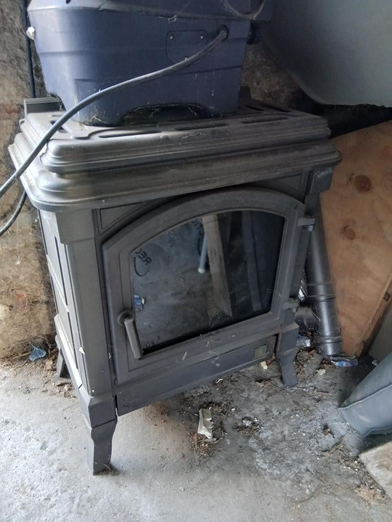 Gietijzeren mazout  kachel  in goede staat!, Maison & Meubles, Enlèvement, Autres carburants
