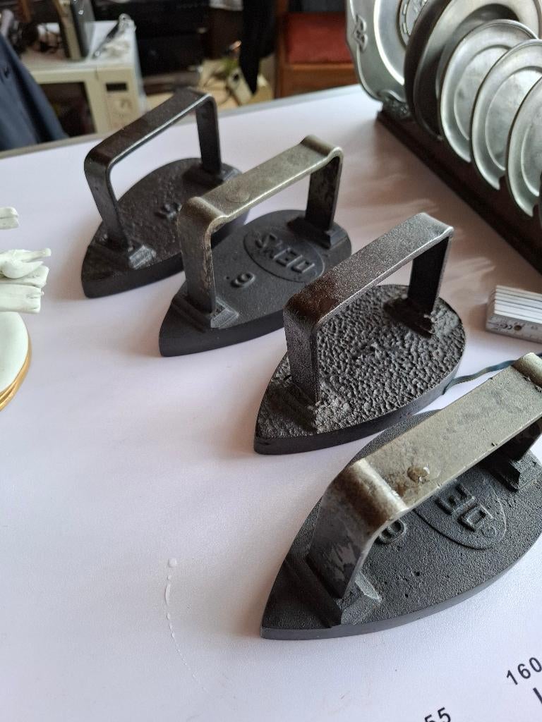 Gietijzeren strijkijzers, Ophalen