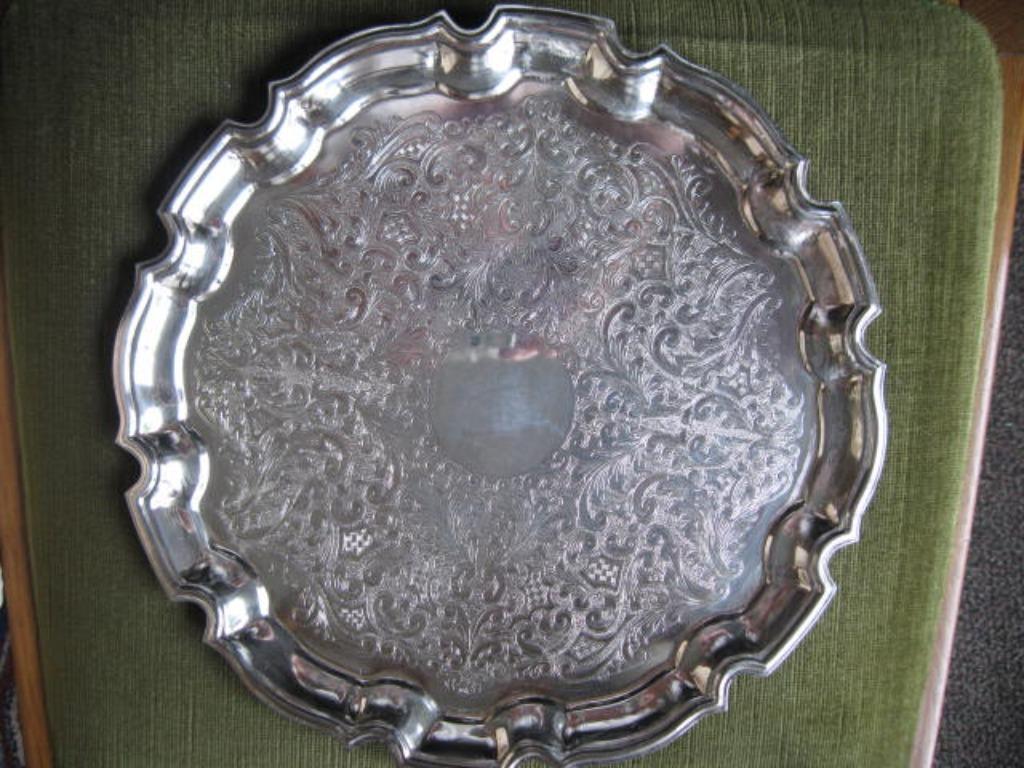 verzilverde serveerschotel, Ophalen