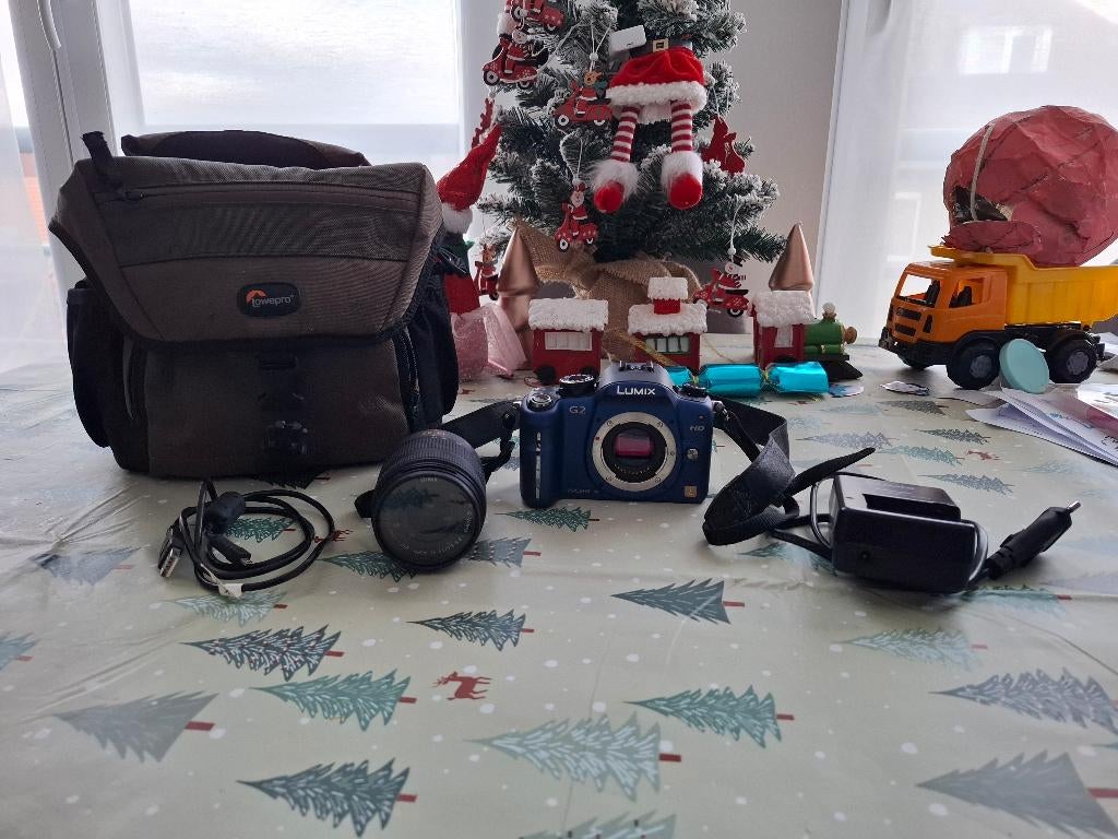 Panasonic Lumix DMC-G2 + Panasonic 14-42 mm hybride lens, Ophalen, Compact, Zo goed als nieuw, 4 t/m 7 keer