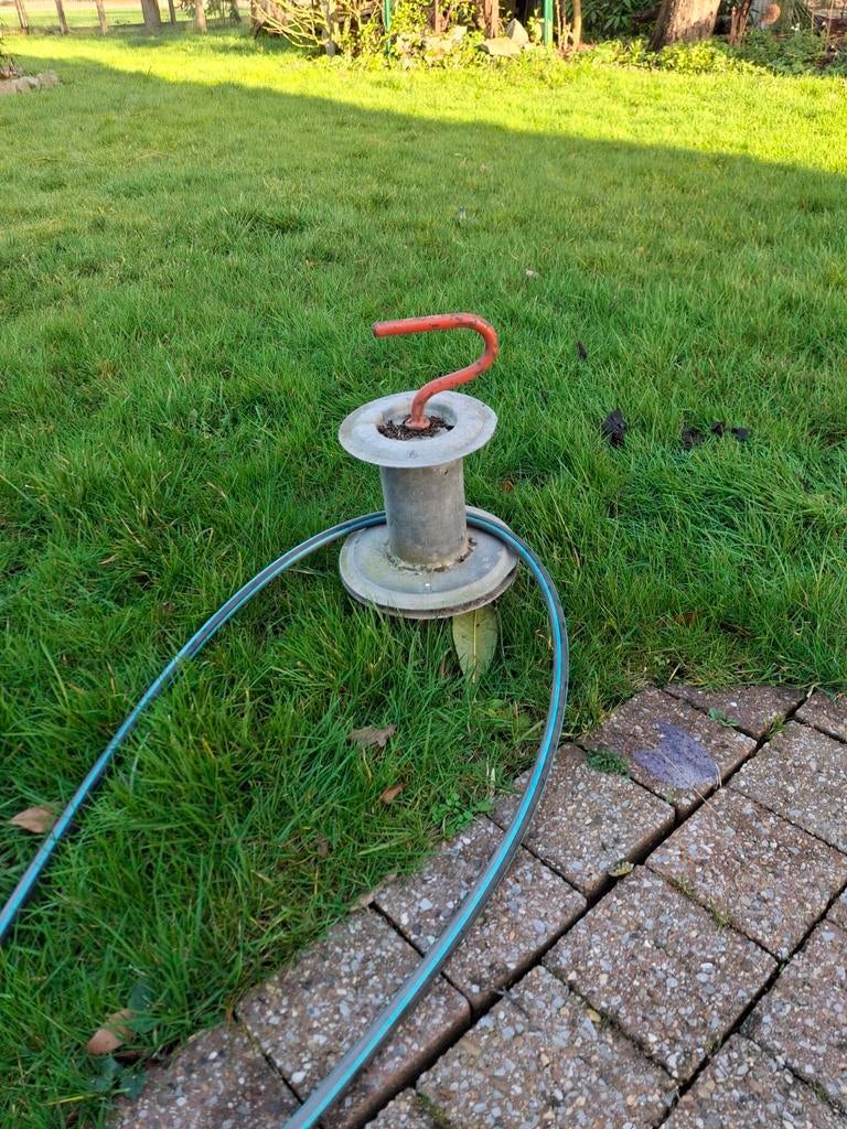 Tuinslang geleider., Ophalen