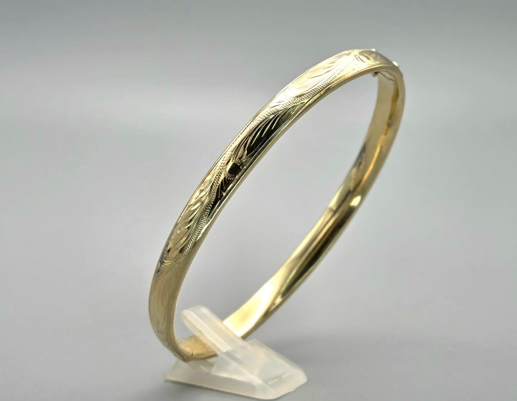 Gouden bewerkte slavenarmband veiligheidsslot. 2025/623., Handtassen en Accessoires, Armbanden, Zo goed als nieuw, Goud, Goud