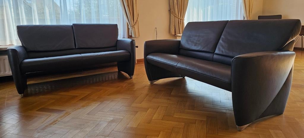 2x JORI 2-zit in grijsachtig Lipanoleder aan SPOTPRIJS., Huis en Inrichting, Fauteuils, Ophalen