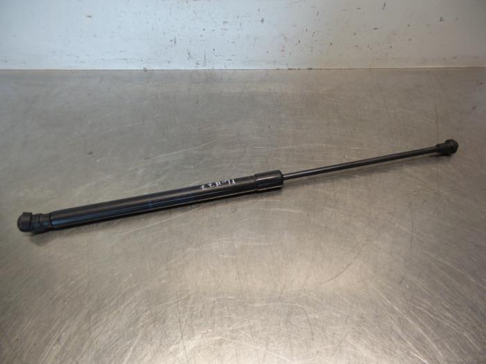 Amortisseur capot moteur gauche d'un Volkswagen Polo (Polo 0, Volkswagen, -, 3 mois de garantie, Utilisé